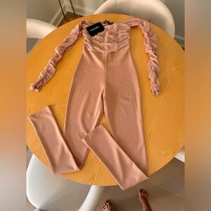 Never worn cream jumpsuit